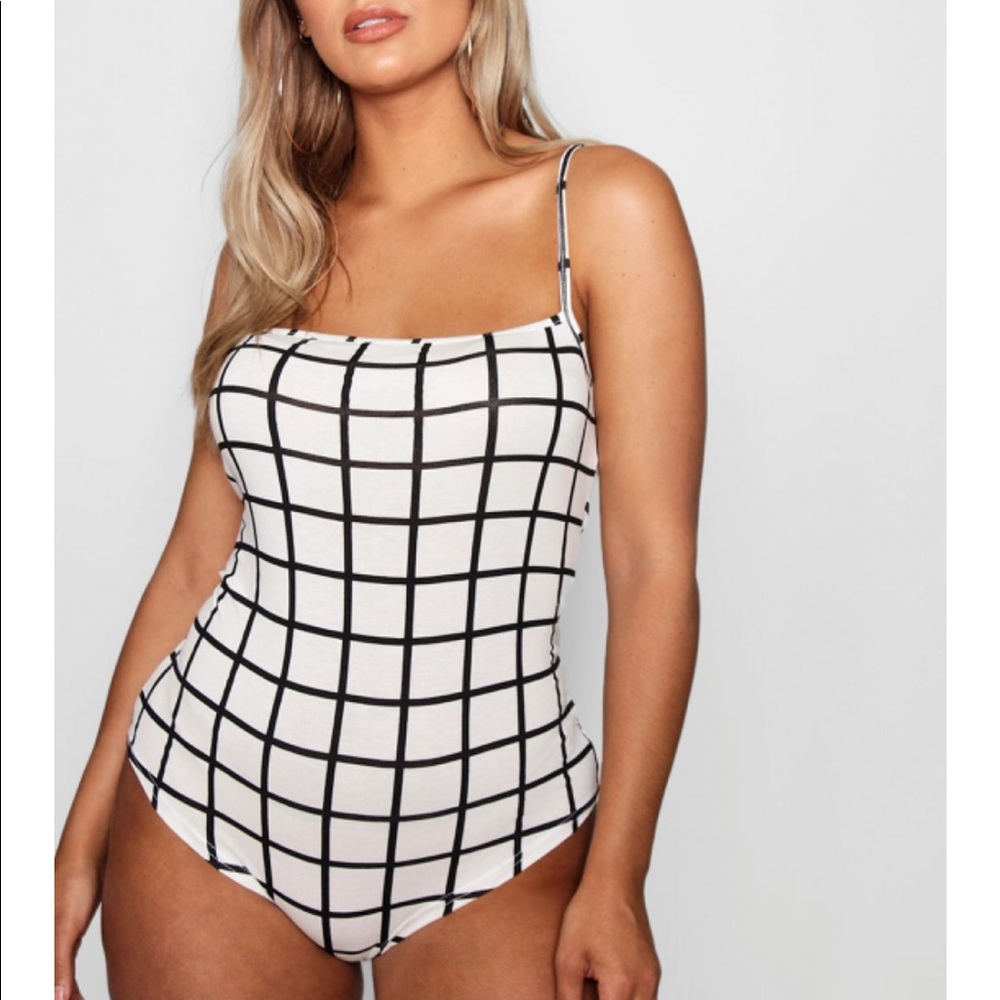 Black and white body suit